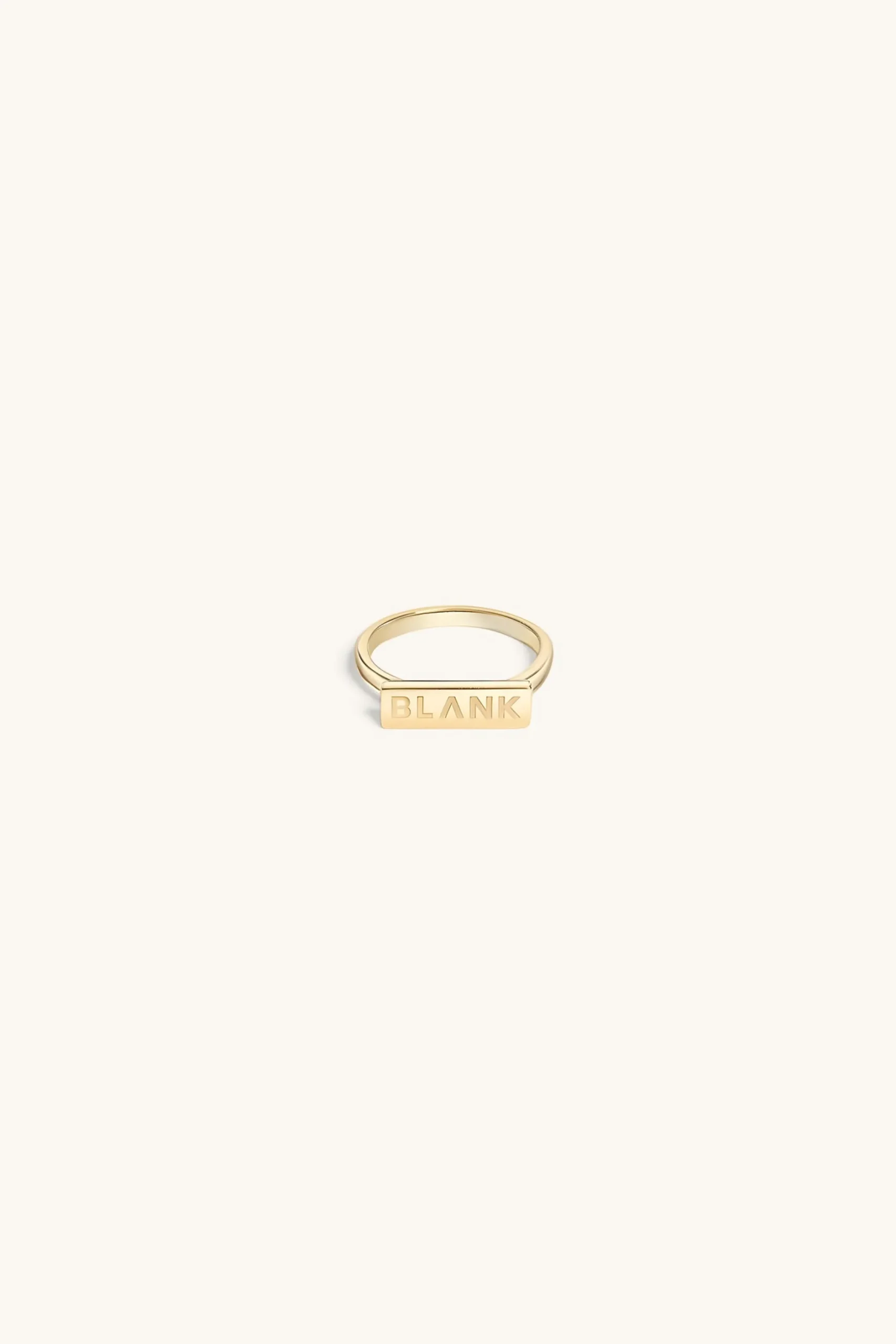 logo_stacker_ring_kt_gold_0.webp 18Kt Gold Plated | Jewellery-BLANK SPACE. LOGO STACKER RING 18KT GOLD